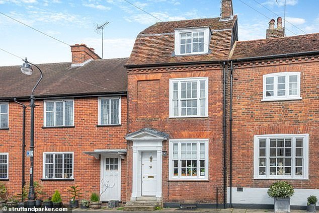 Close to the famous Cathedral and Verulamium Park, this Grade II listed three-bedroom period gem has a mansard roof and Victorian red brick elevations, £915,000