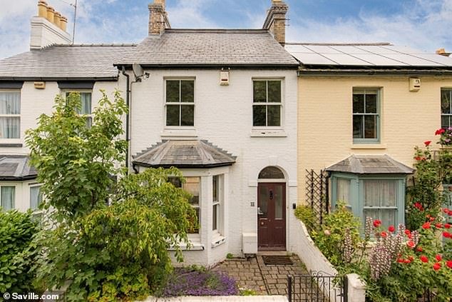 Three bedroom Victorian house with stripped pine doors and ornate plaster ceiling roses, a long 'through' reception room, family room and kitchen plus a rear walled garden, £875,000