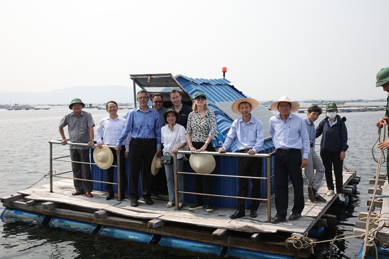 CSIRO and Vietnamese teams on a barge in Vietnam