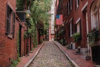 Cobblestone side street in Boston, MA. The famous Acorn street is considered the most photographed street in Boston.