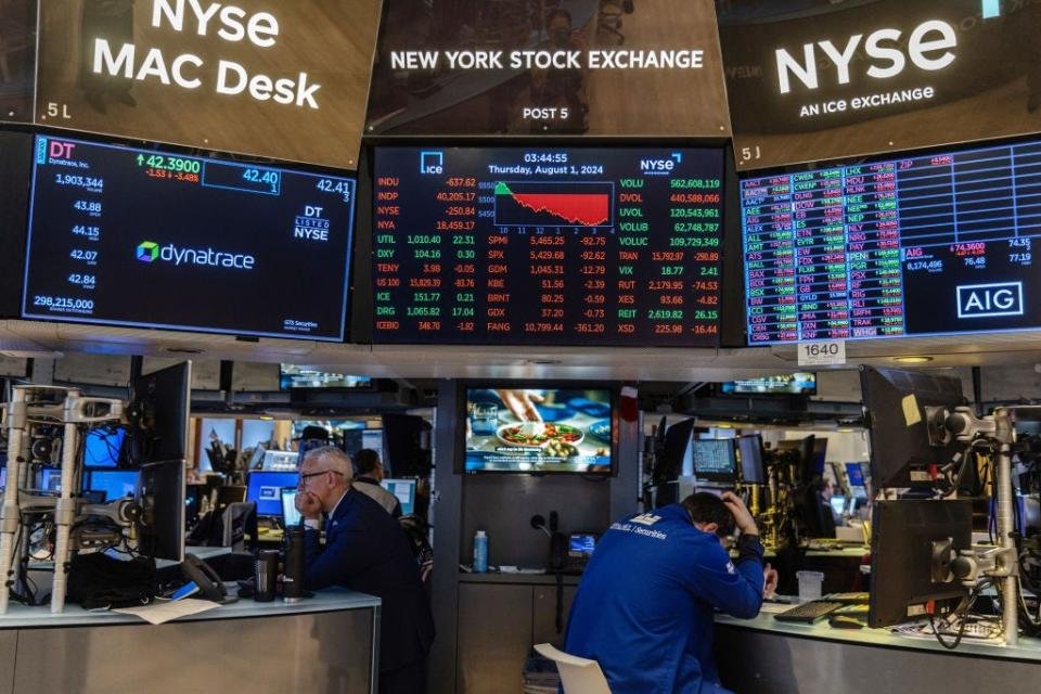 Traders at the New York Stock Exchange