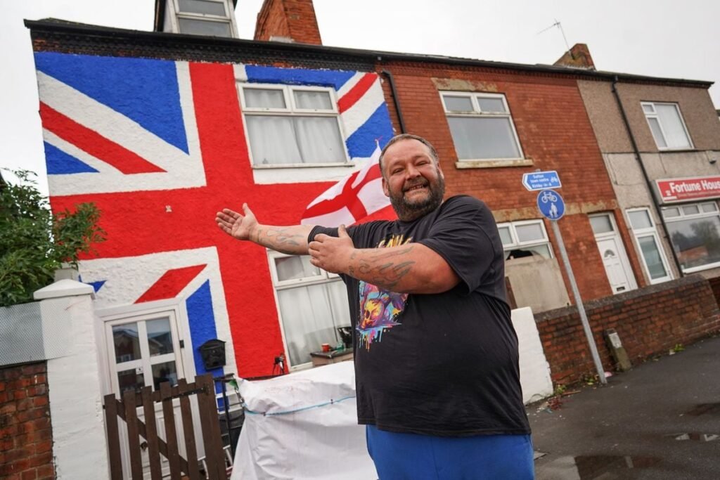 Neighbours worried about property values after massive Union Flag painted on house