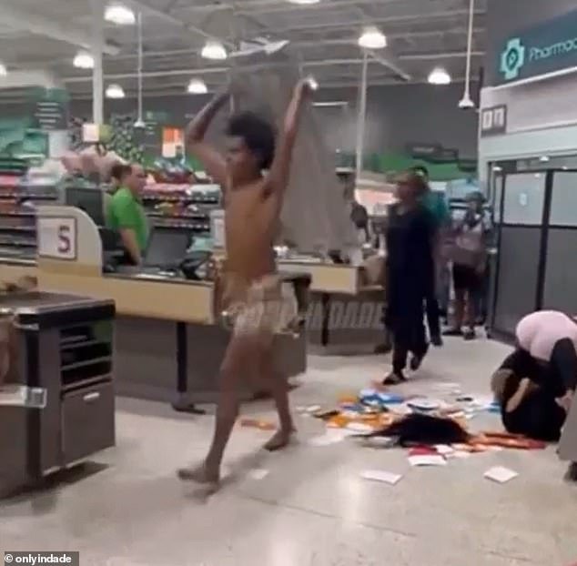 Supermarket hellscape sees shirtless man rip down shelf to attack terrified shoppers